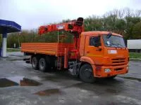 Бортовой автомобиль КАМАЗ 65115 с манипулятором Kanglim KS 2056